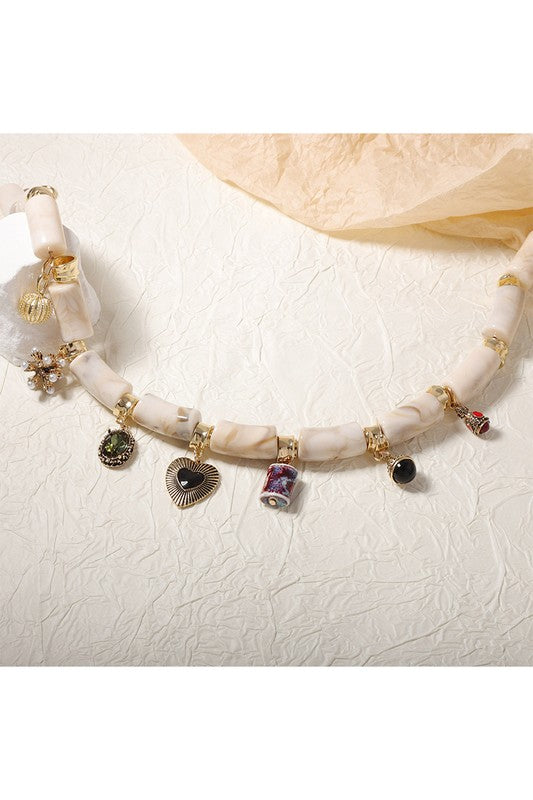 Chunky Resin Bamboo Necklace with Charms – Gold Accents