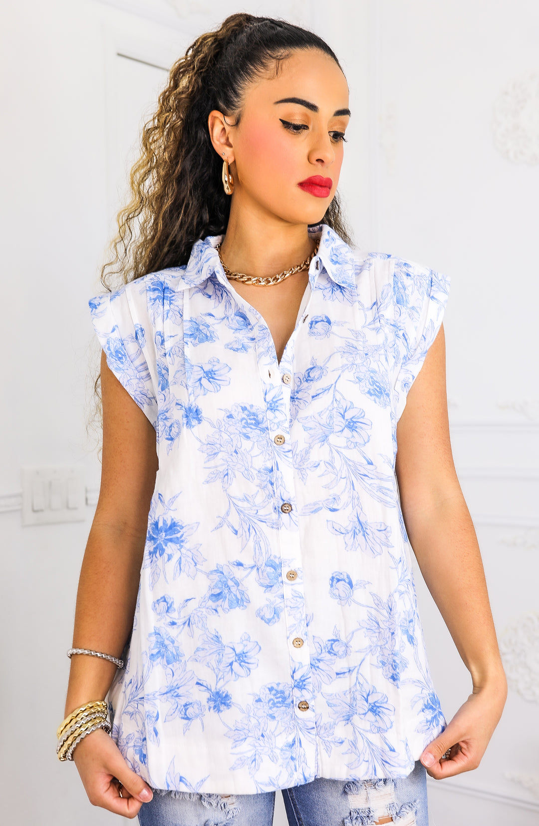 Blue Floral Sleeveless Button-Down Blouse