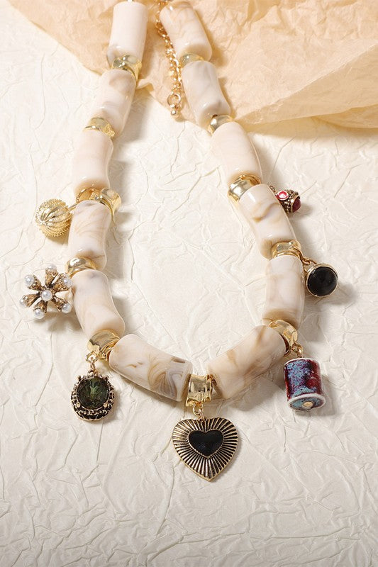 Chunky Resin Bamboo Necklace with Charms – Gold Accents