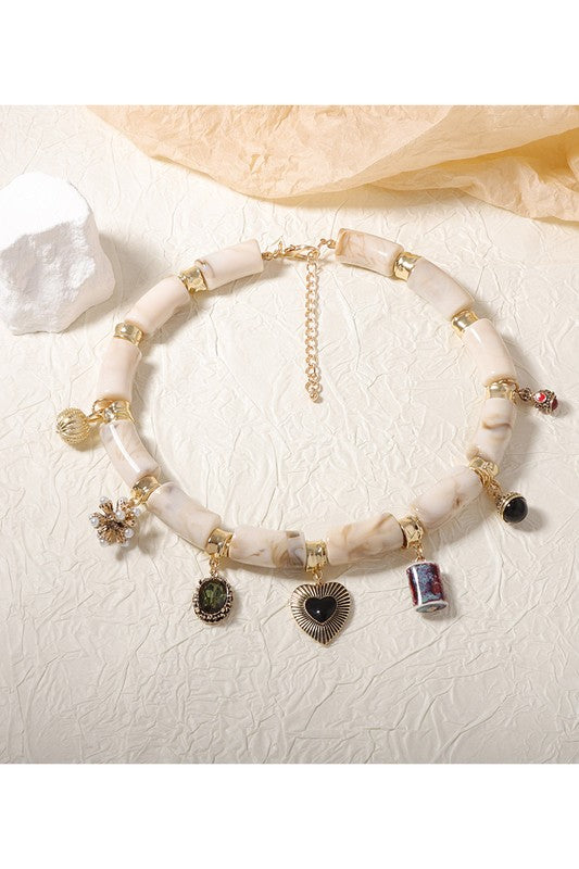 Chunky Resin Bamboo Necklace with Charms – Gold Accents