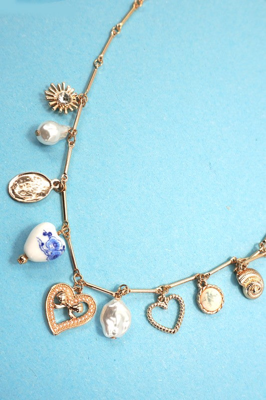 The Storyteller Charm Necklace – Vintage Gold Heart & Pearl